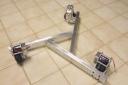 Motors and wheels mounted to frame