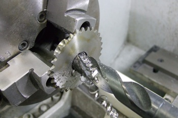 Enlarging Hole in sprocket to accept Nylon bearing Enlarging Hole in sprocket to accept Nylon bearing